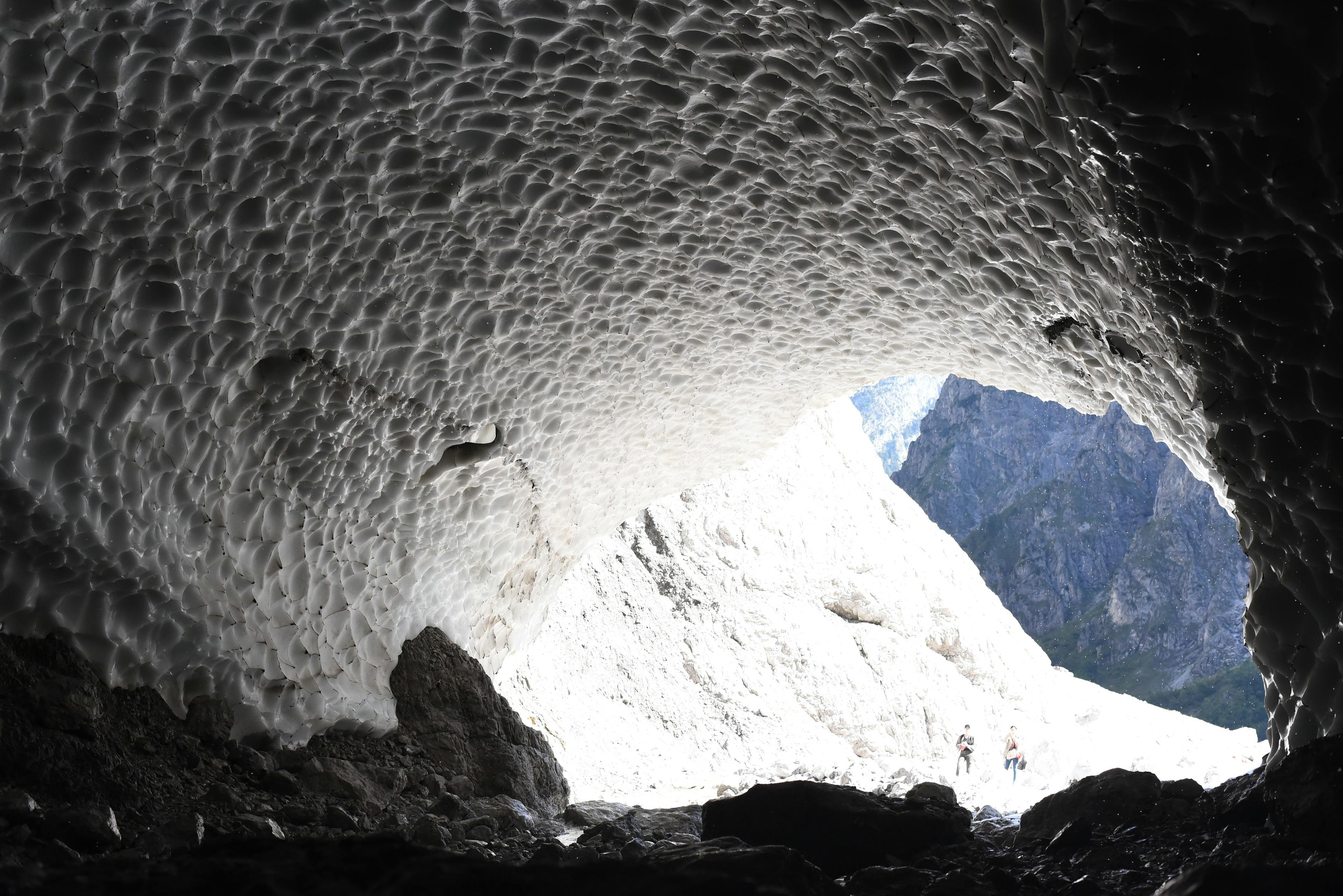 Icy cave in mountains